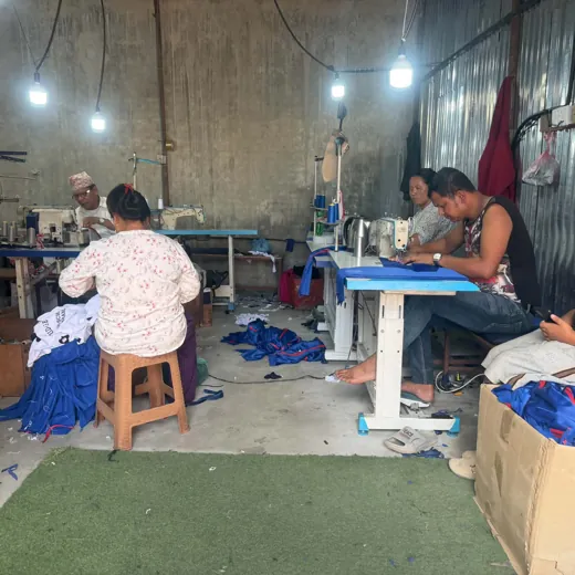 School uniform manufacturing line in Nepal